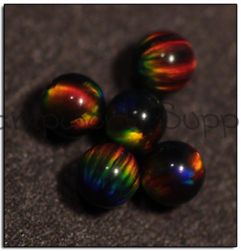 Kyocera 2mm Sphere Opal - Black Yellow Yellow Fire