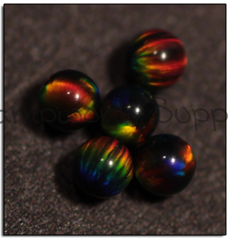 2mm Black Sphere Opal with Yellow Fire