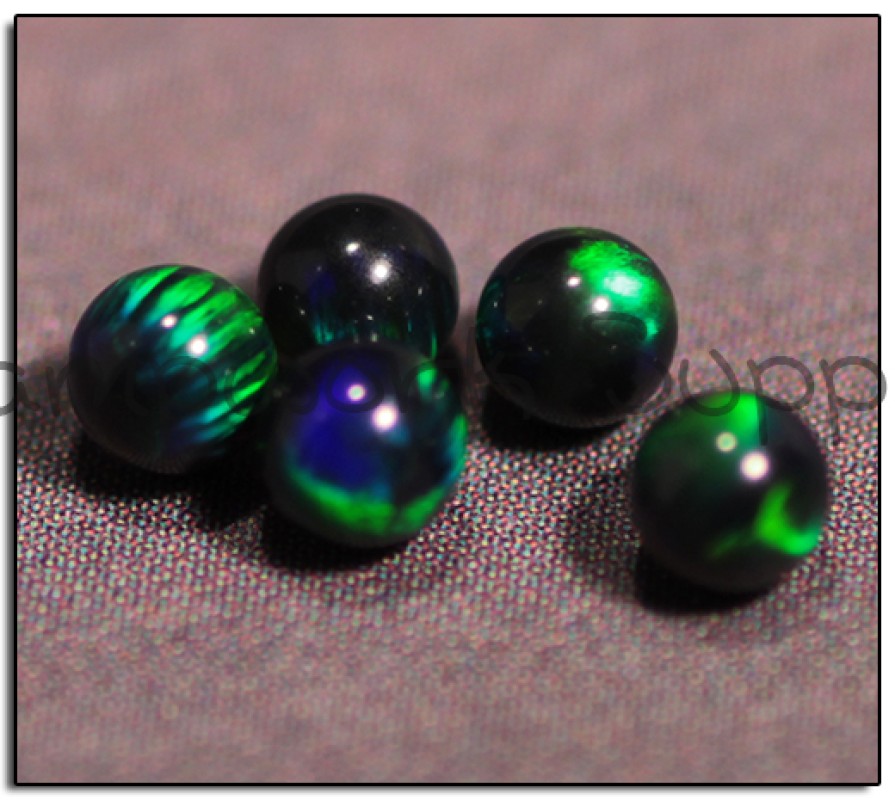 2.5mm Black Sphere Opal with Green Fire
