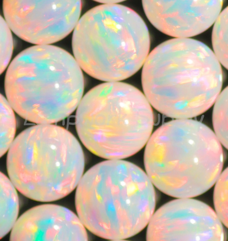 5mm Pink Sphere Opal with Red Fire