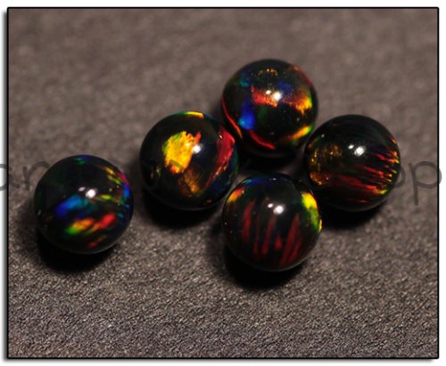 Kyocera 4mm Sphere Opal - Black Yellow Yellow Fire