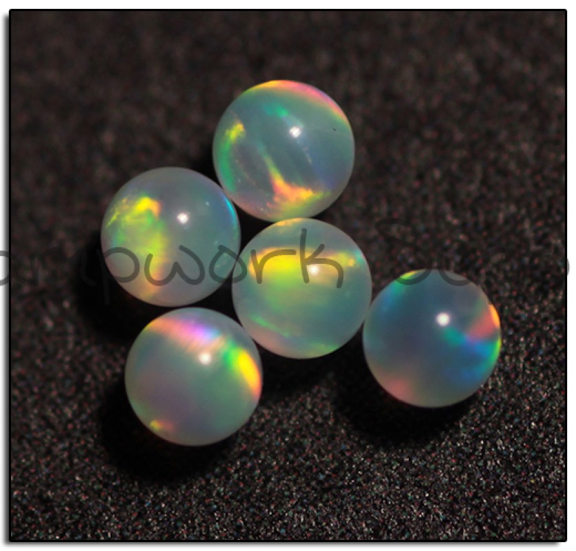 2mm Pink Sphere Opal with Red Fire